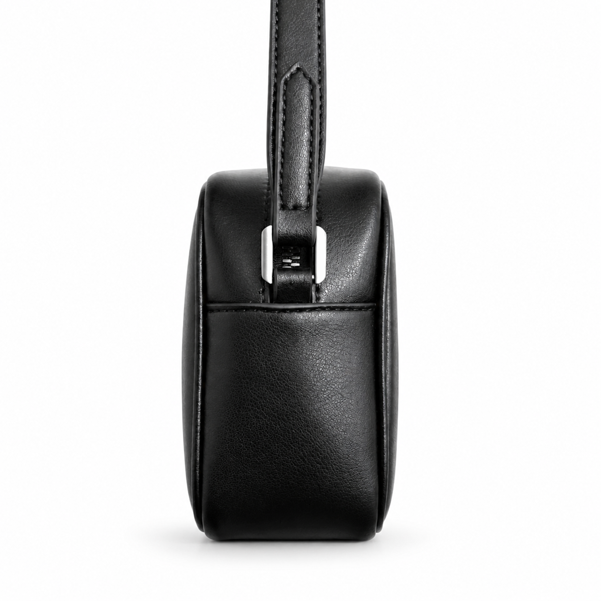 Black leather handbag with a strap on a white background
