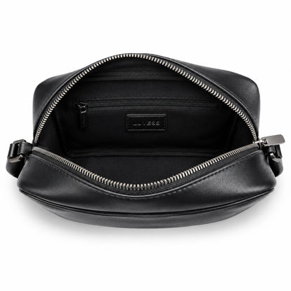 Black leather bag with open zipper on a white background