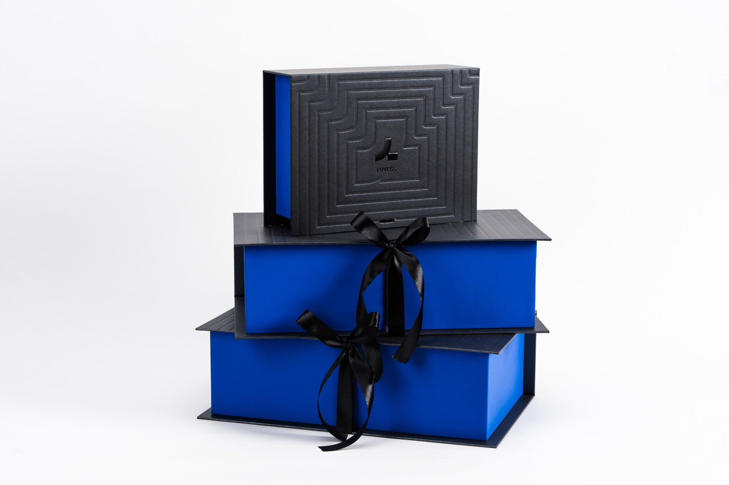 A stack of premium LUYESS gift boxes, highlighting that truly good gifts are remembered through daily use